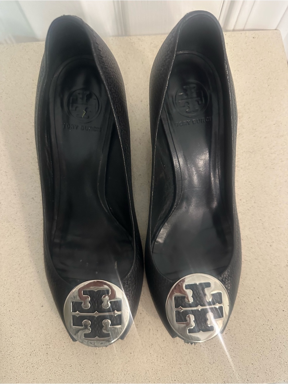 Tory Burch Black Leather Wedge Pumps with Silver Logo Women’s